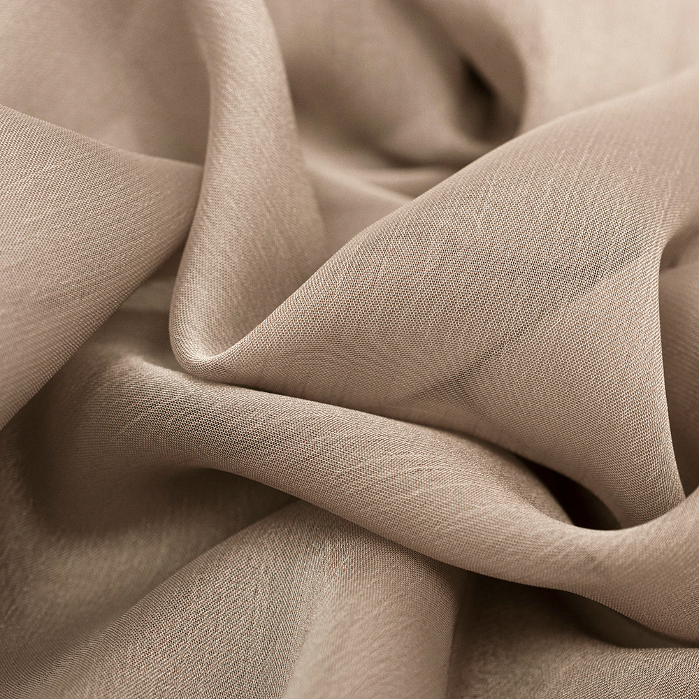 Szyfon Perła to doskonałej jakości tkanina, idealnie nadaje się na eleganckie i szykowną odzież.