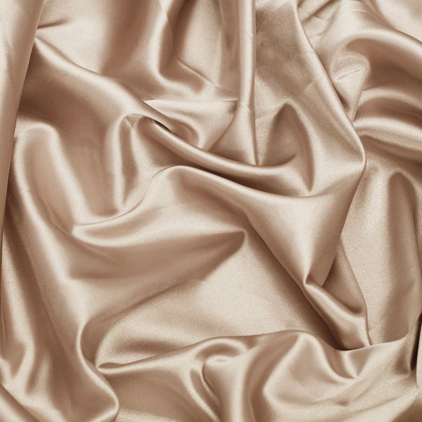 Tkanina satynowa o jednolitym zabarwieniu.