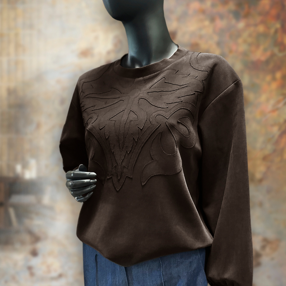 Dzianina Arizona to wysokiej jakości materiał o gęstym splocie, który zapewnia trwałość i estetyczny wygląd.