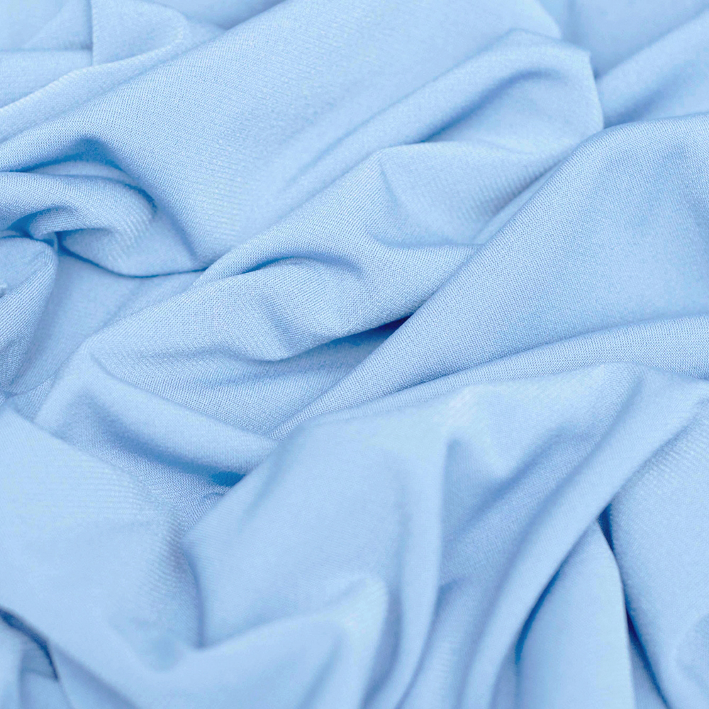 Dzianina elastyczna typu ITY – Super Jersey, wykonana z wysokiej jakości włókien syntetycznych.