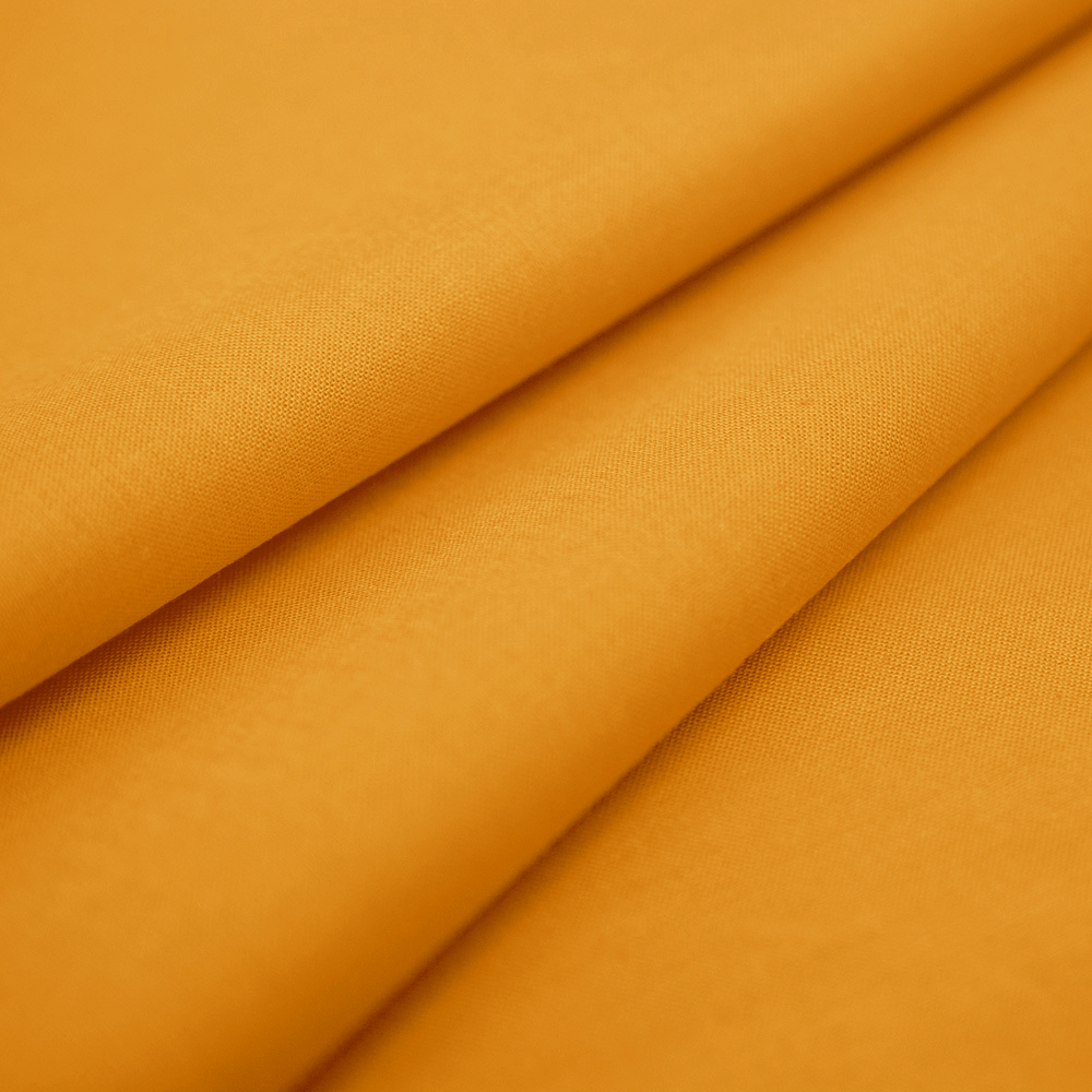 Tkanina bawełniana o splocie płóciennym, wyprodukowana w Polsce.