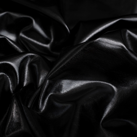 Elastyczna dzianina w typie lama o charakterystycznym, metalicznym połysku.