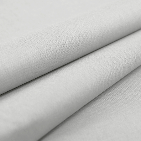 Tkanina bawełniana o splocie płóciennym, wyprodukowana w Polsce.