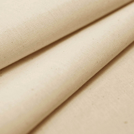 Surowa bawełna to naturalna, niebarwiona tkanina o prostym, klasycznym wyglądzie.