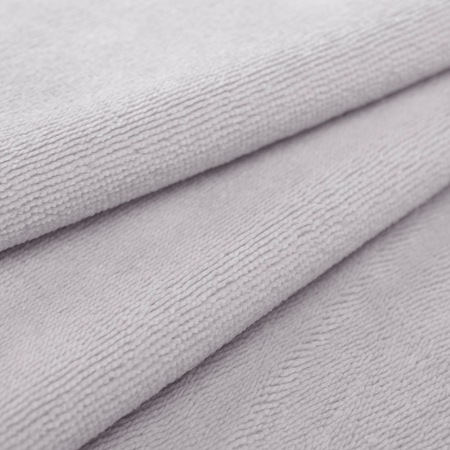 Tkanina Frotte wykonana z mieszanki włókien bawełnianych oraz bambusowych.