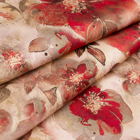 Wzorzysta tkanina wiskozowa o subtelnym, satynowym połysku.