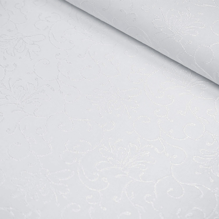 Obrusowa tkanina typu żakardowego w kolorze białym.