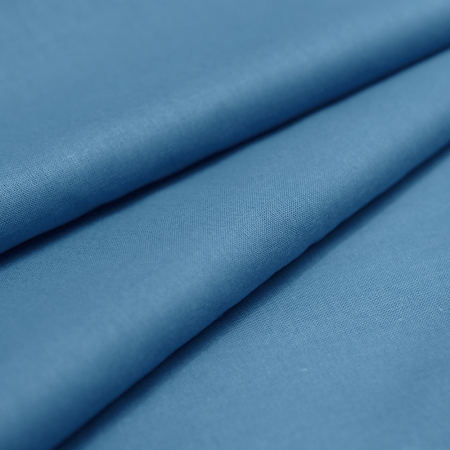 Tkanina bawełniana o splocie płóciennym, wyprodukowana w Polsce.