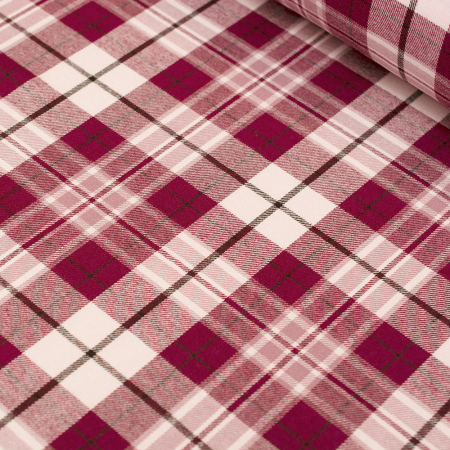 Miękka flanela wykonana z połączenia włókien bawełnianych i syntetycznych, w modnym wzorze kraty.
