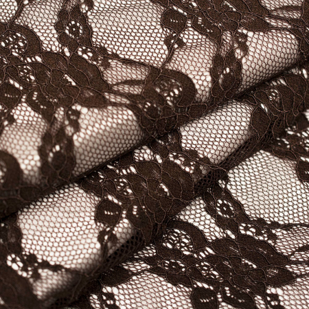 Koronka na elastycznej siatce to wyjątkowa tkanina, która łączy subtelność z wygodą użytkowania.