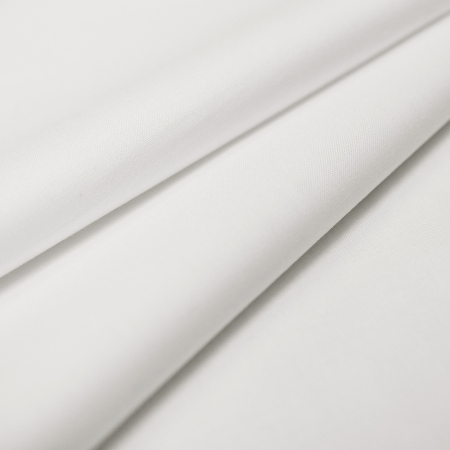 Tkanina bawełniana o splocie płóciennym, wyprodukowana w Polsce.