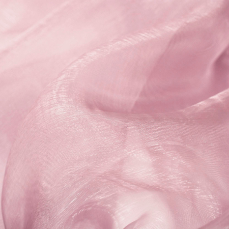 Organza o subtelnym blasku, delikatna, transparentna tkanina, która zachwyca swoją elegancją i unikalnymi właściwościami.