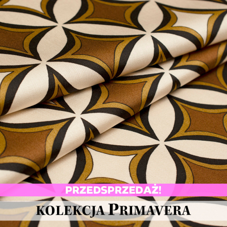 Wzorzysta tkanina wiskozowa o subtelnym, satynowym połysku.