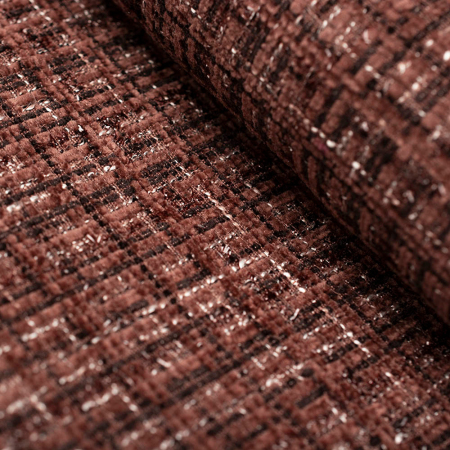 Tkanina chanelka to elegancki i szykowny materiał, który wyróżnia się charakterystycznym splotem z cieńszej i grubszej przędzy.