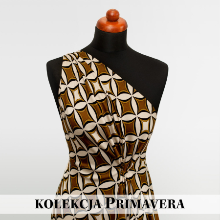 Wzorzysta tkanina wiskozowa o subtelnym, satynowym połysku.