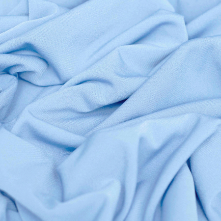 Dzianina elastyczna typu ITY – Super Jersey, wykonana z wysokiej jakości włókien syntetycznych.